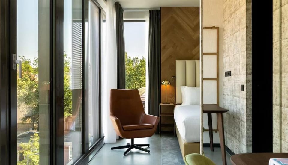 Soak in morning light from the window-side reading chair.