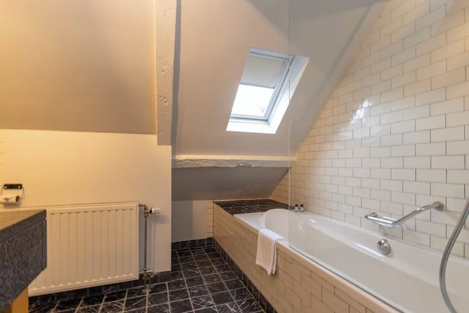 Soak under the skylight in a deep, relaxing tub.