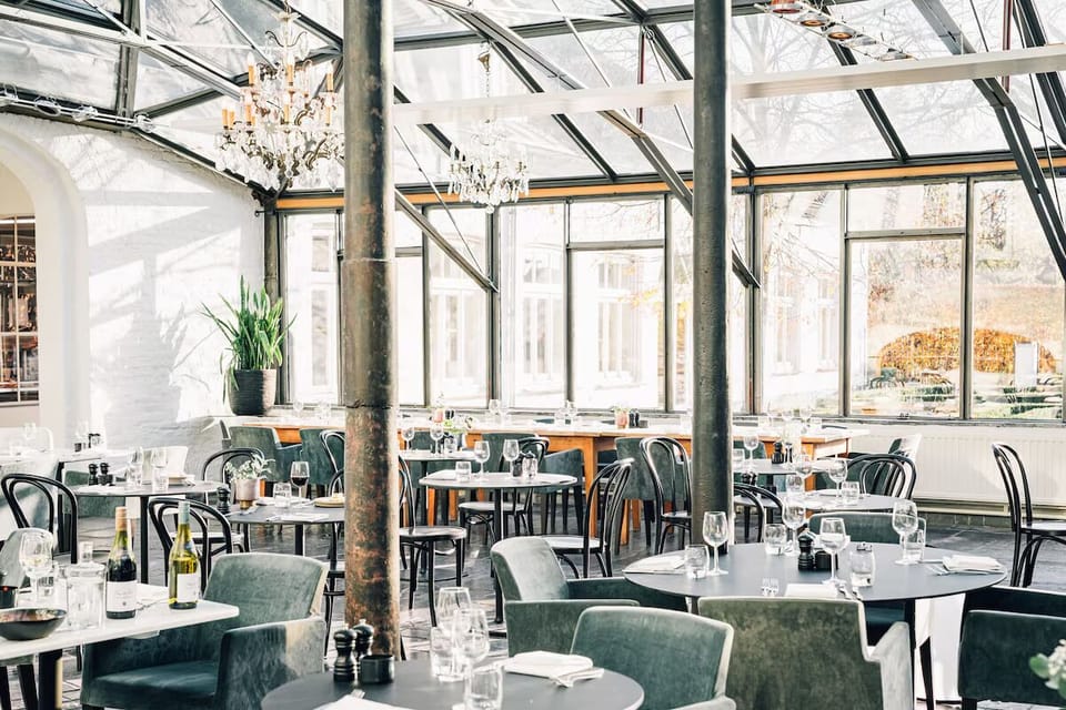 Linger over breakfast in the spacious indoor garden setting.