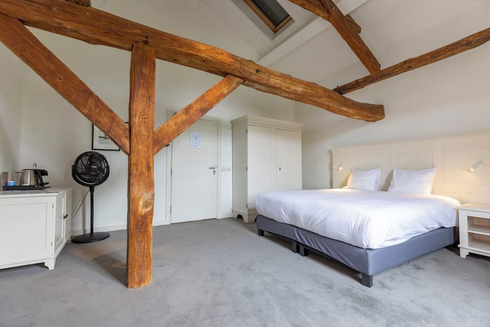 Settle in comfortably with ample storage and thoughtful in-room conveniences.