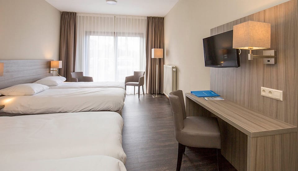 Catch up on work, then relax with in-room TV comfort.