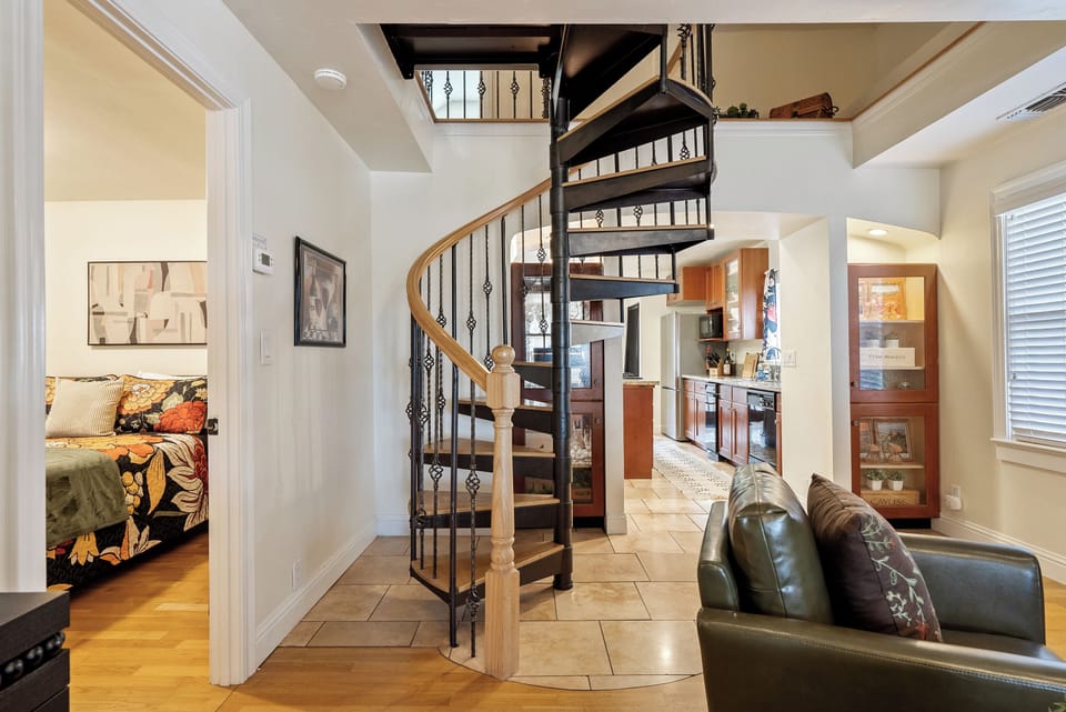 Gather in the open lounge with a spiral staircase centerpiece