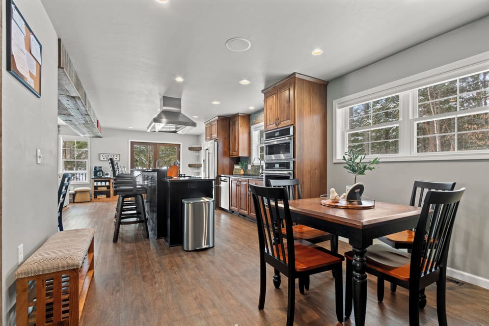 Open living room, kitchen, and dining with plenty of seating for everyone!