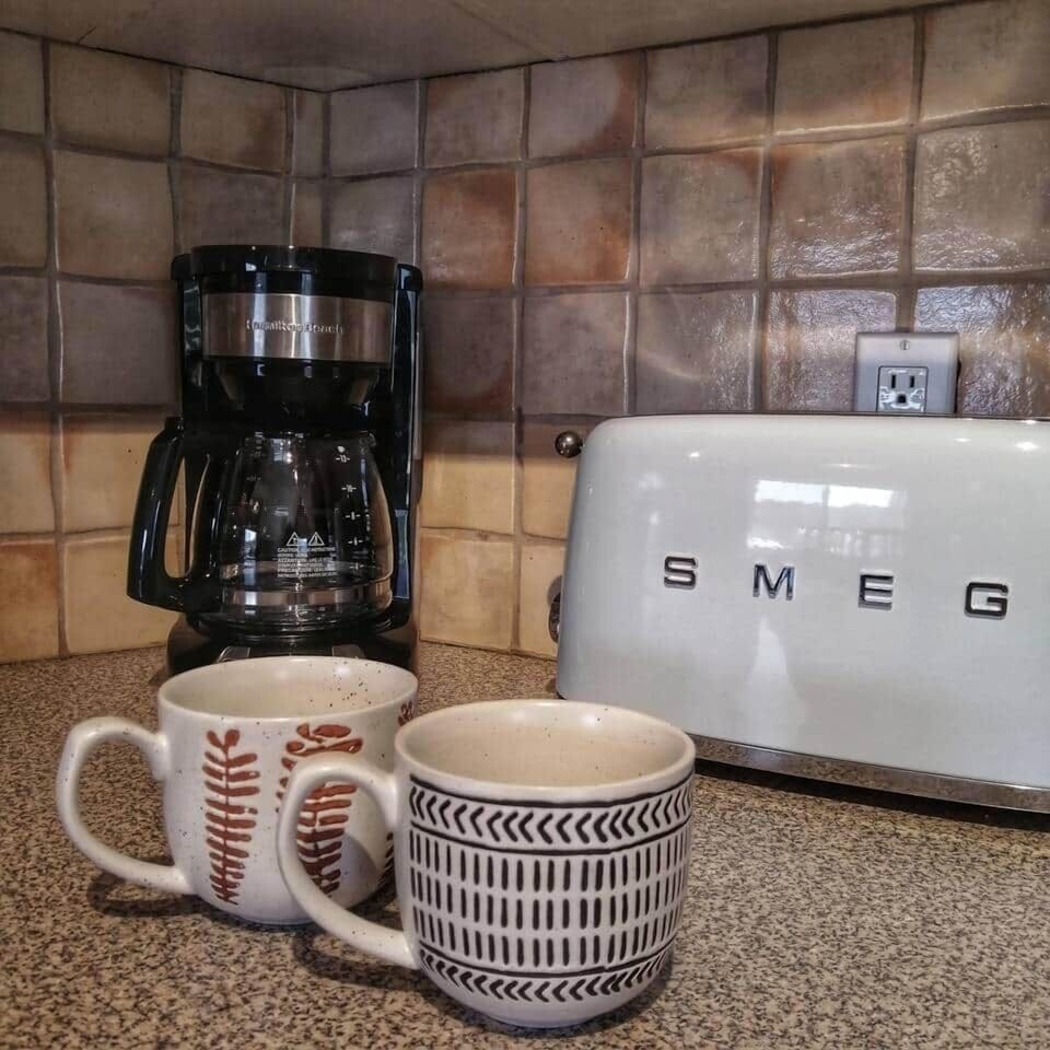 Our fully equipped kitchen includes a 12 cup drip coffee maker.