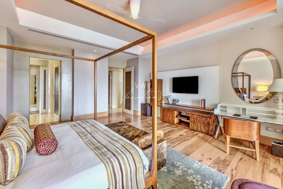 Bedroom #1: King Main Floor Master Suite with private bathroom & walkout doors