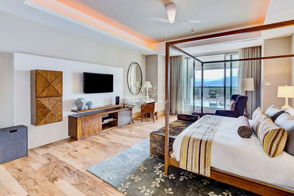 Bedroom #1: King Main Floor Master Suite with private bathroom & walkout doors