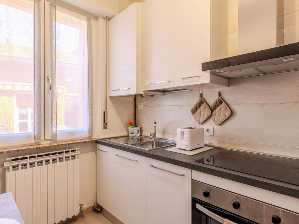 Kitchen, Kitchen Appliance, Countertop, Major Appliance, Cabinetry, Wood, Kitchen Sink, Kitchen Stove, Stove, Flooring