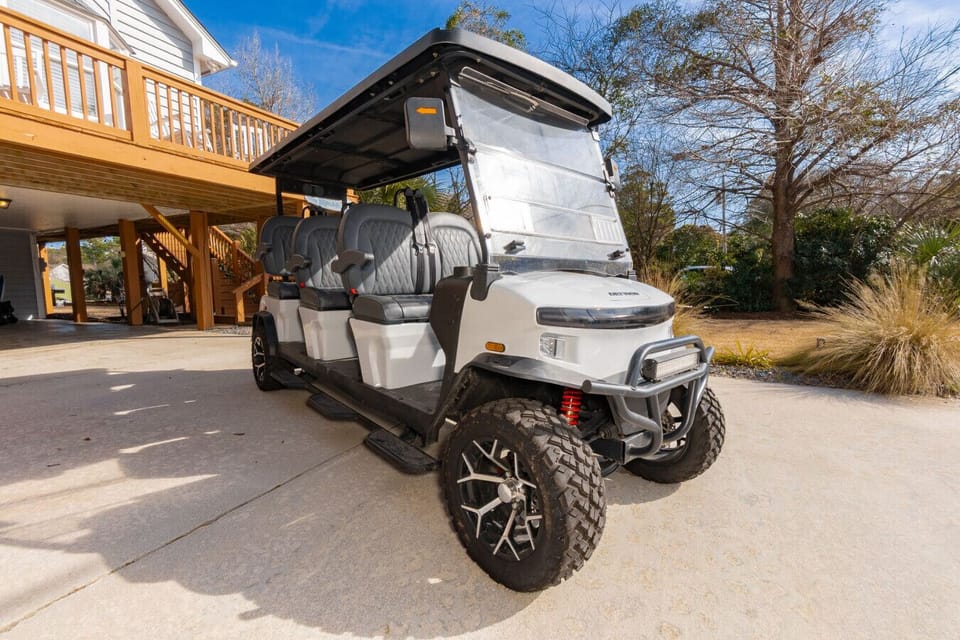 6 seat luxury golf cart included with your stay!
