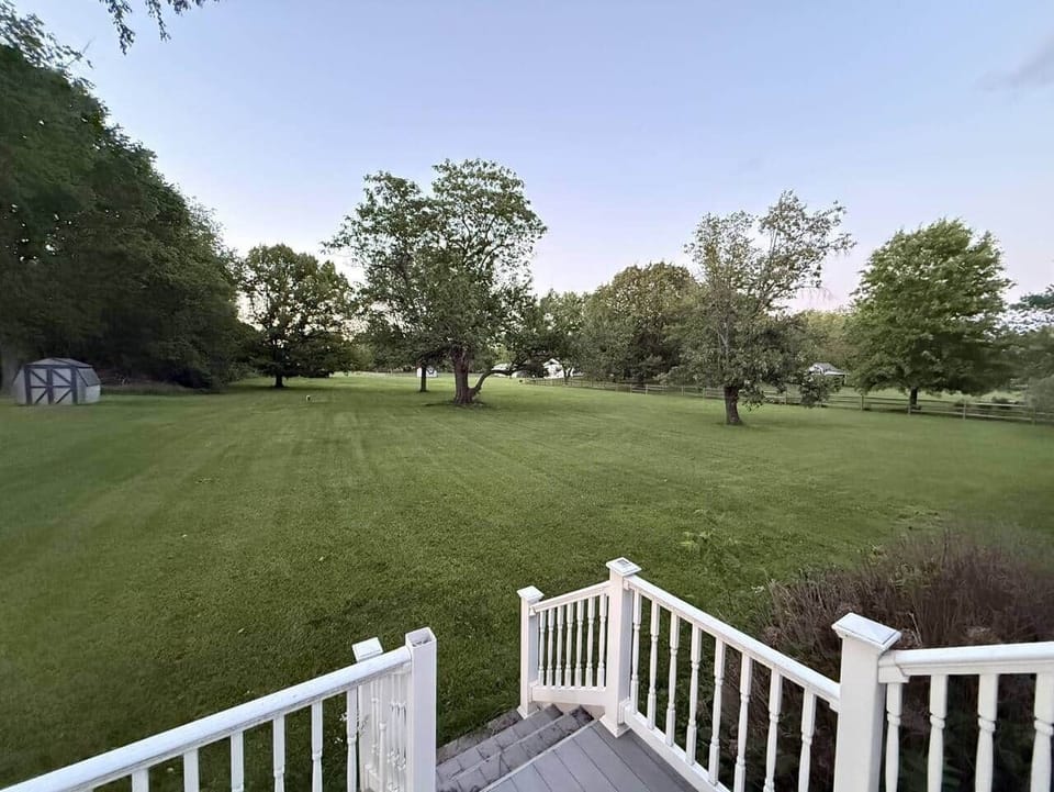 Spacious front lawn for relaxing outdoors.