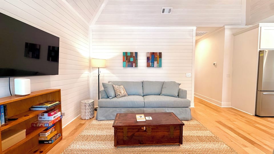 92" queen sleeper sofa, 55" smart TV, oversized luxury, swivel chair.