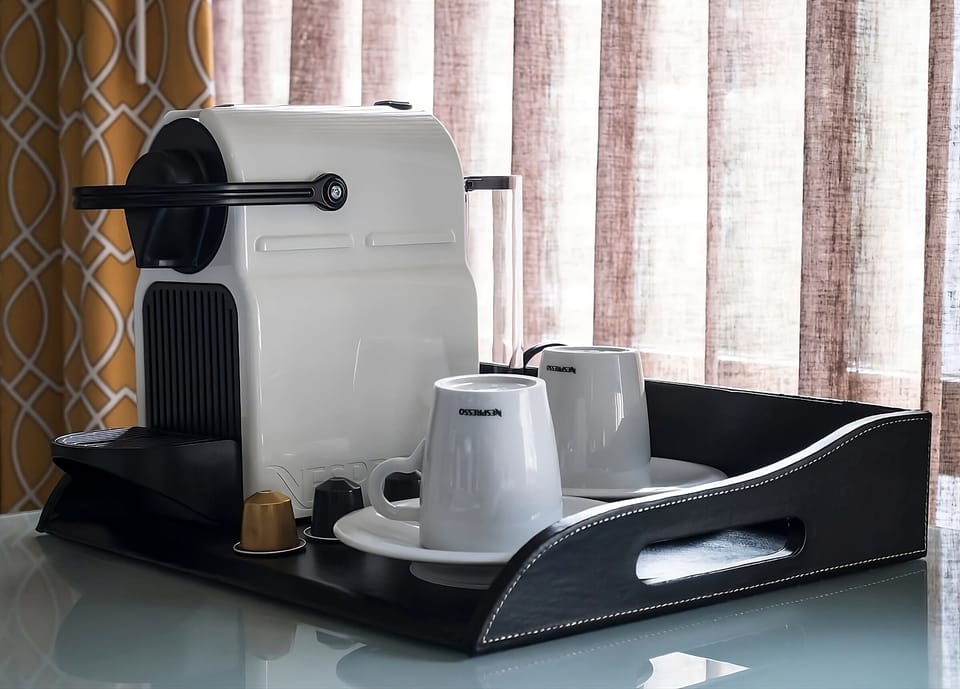 Start mornings right with espresso and a cozy in-room tray.