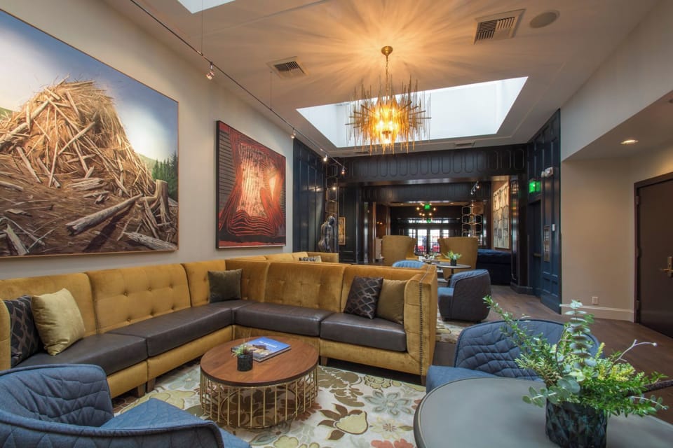 Gather under the statement chandelier for a cozy nightcap.