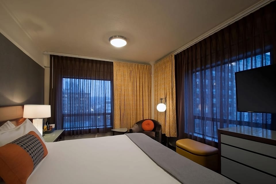Settle into the cozy corner chair and watch evening views.