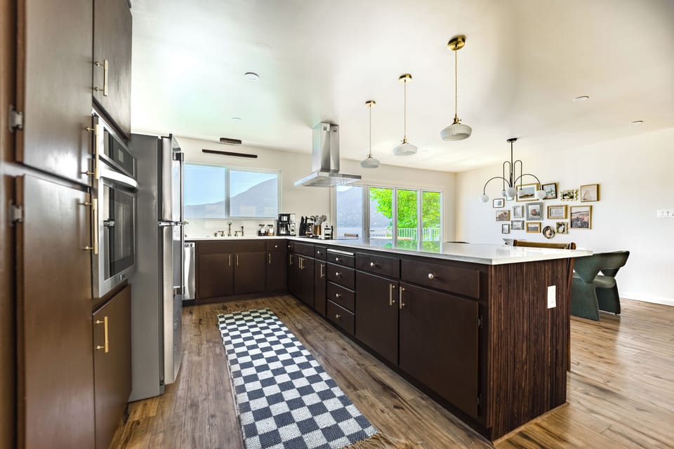 Warm, fully equipped kitchen, w/ every cabinet fully stocked to cook & entertain