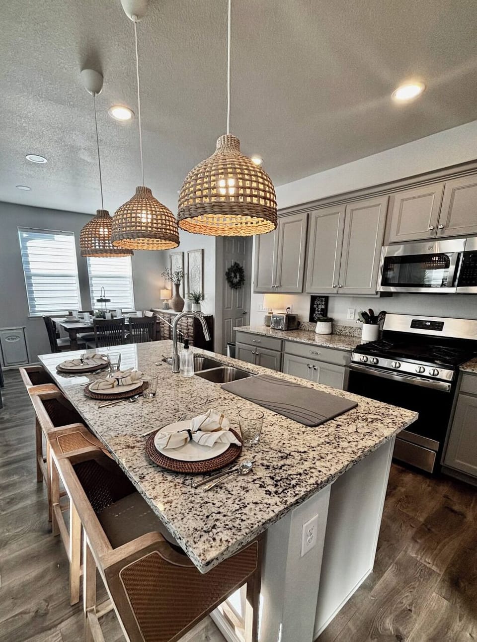 Spacious kitchen with island seating, perfect for gathering.