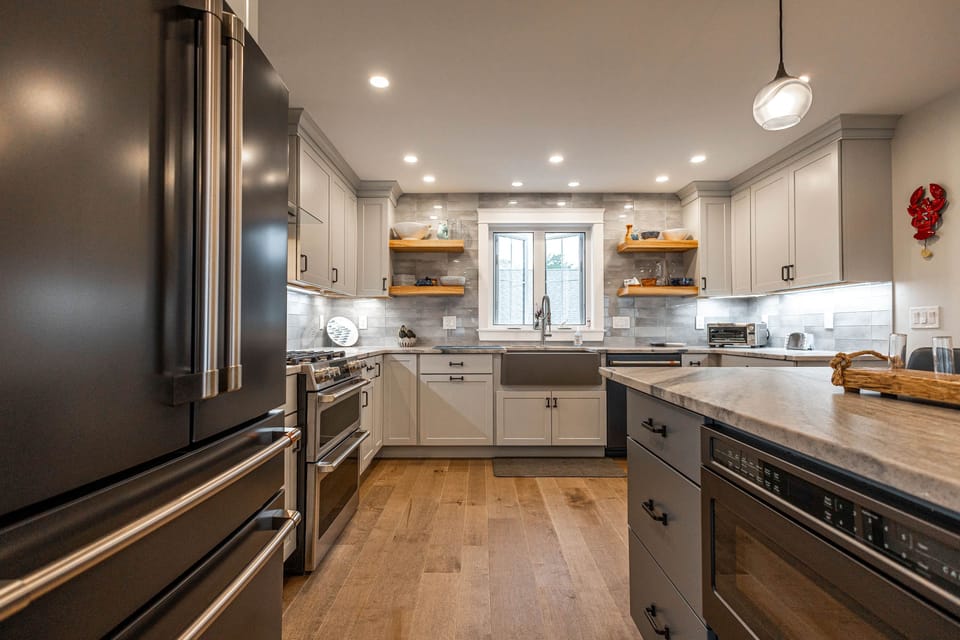 Chef’s kitchen with GE Cafe Appliances and entertaining island