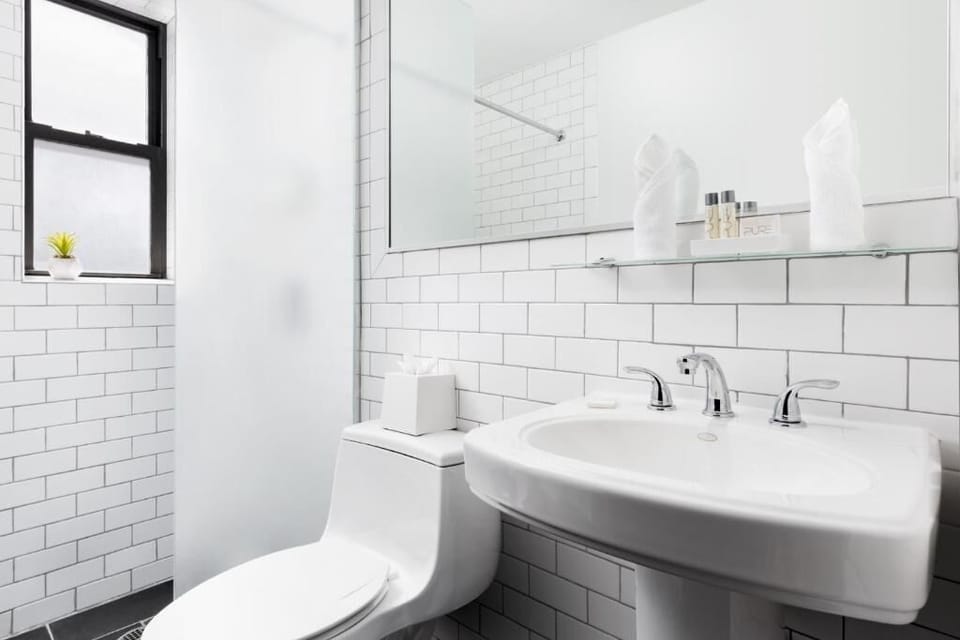 Start the day refreshed with bright lighting and clean finishes.