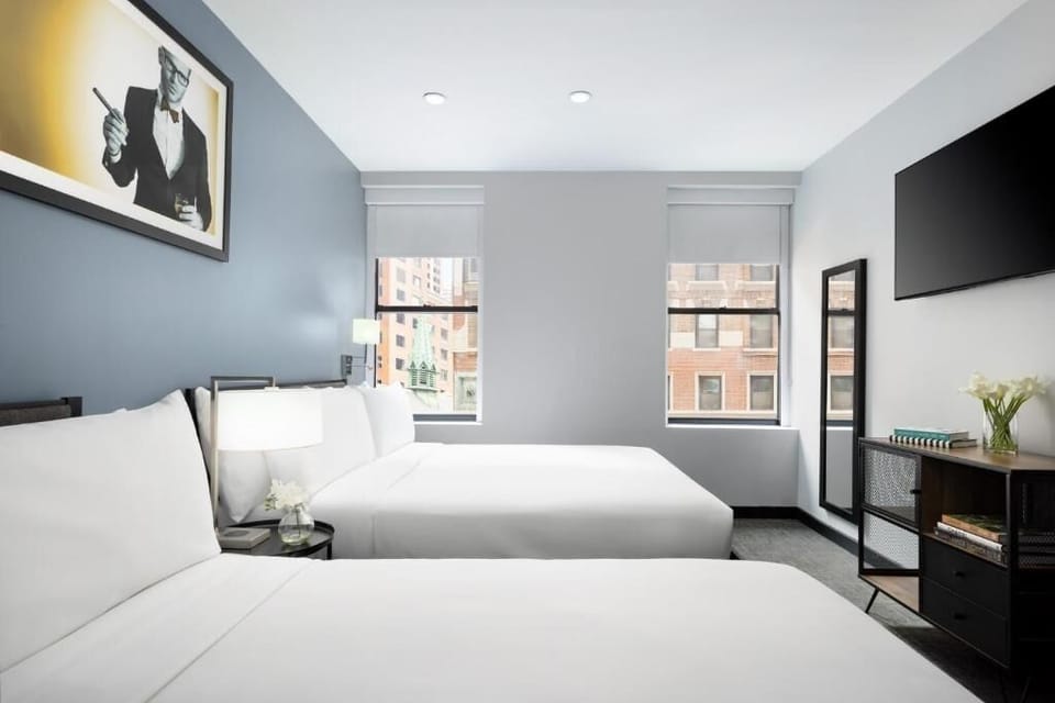 Wake up to city light in a bright, airy retreat.