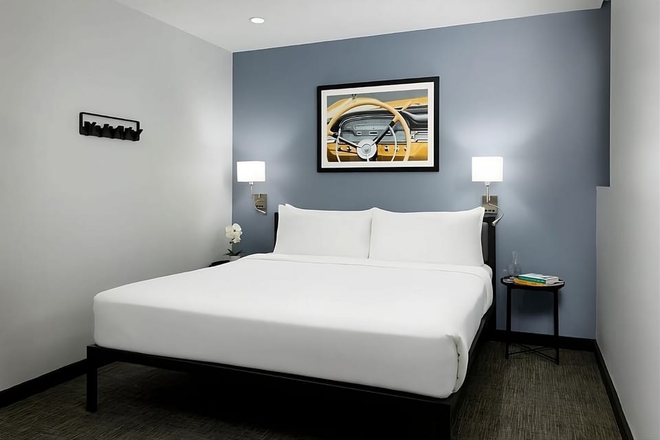 Drift off peacefully in a cozy king bed sanctuary.