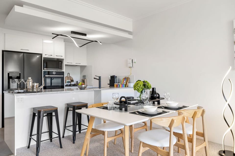 Open plan Kitchen  and dining area with Breakfast bar and coffee machine