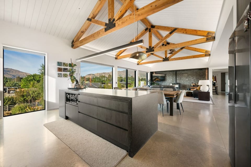 A chef`s dream - premium appliances, stone benchtops, and an oversized island designed for serious cooking and casual breakfast gatherings alike