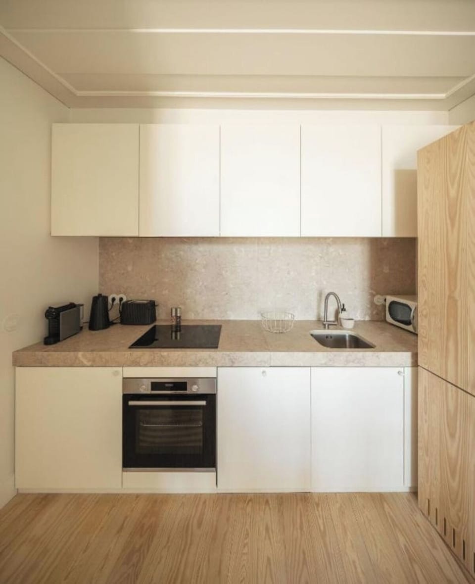Cook with ease in a sleek, fully equipped modern kitchen.