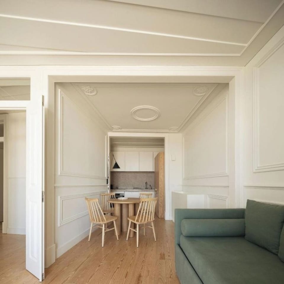 Relax in airy elegance with an open-plan lounge and dining.