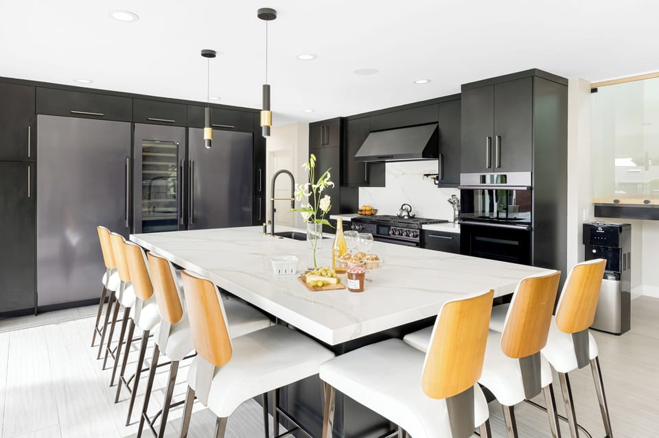 Gourmet kitchen with large island and barstool seatings.