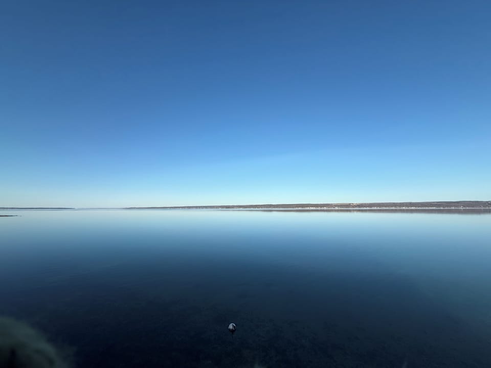 Savor the expansive lake views from the private beach.