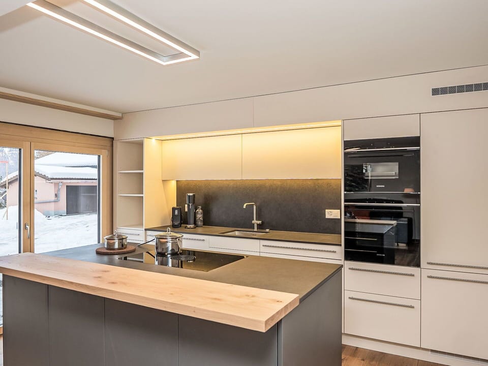 Kitchen, Interior Design, Flooring, Countertop, Wood, Ceiling, Kitchen Appliance, Light Fixture, Cabinetry, Lighting