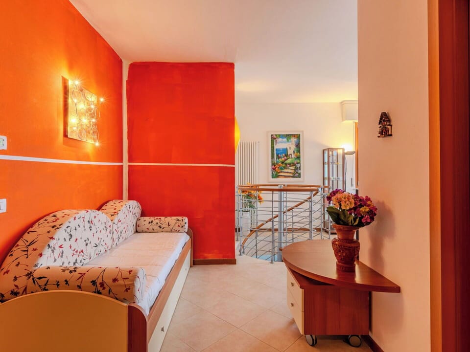 Interior Design, Flooring, Furniture, Floor, Ceiling, Orange, Room, Apartment, Living Room, Chair