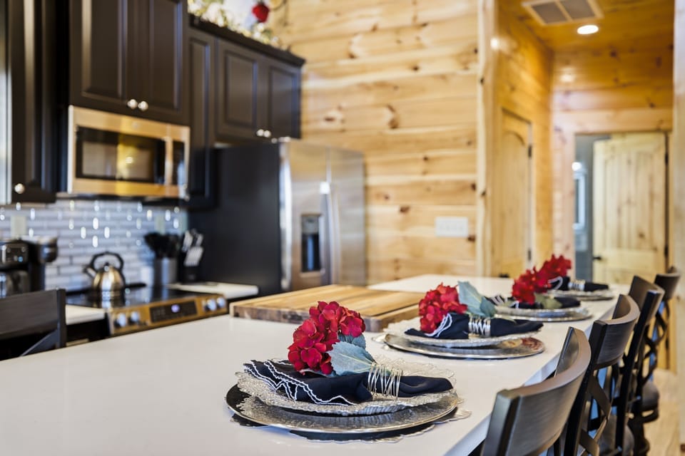 Cabin in Wears Valley with a Bowling Alley "Let The Good Times Roll" - Kitchen island and fully furnished kitchen