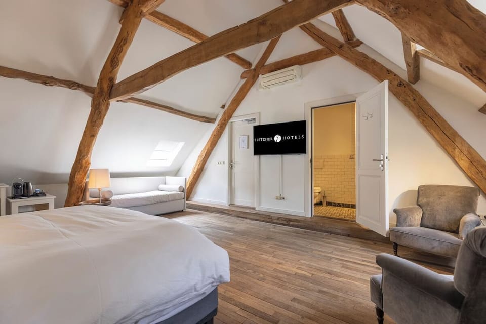 Stretch out with lounge seating and easy in-room entertainment