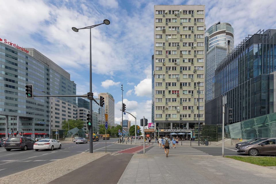 Modern residential building where the apartment is located, situated in a vibrant city district with convenient access to transport and urban amenities.