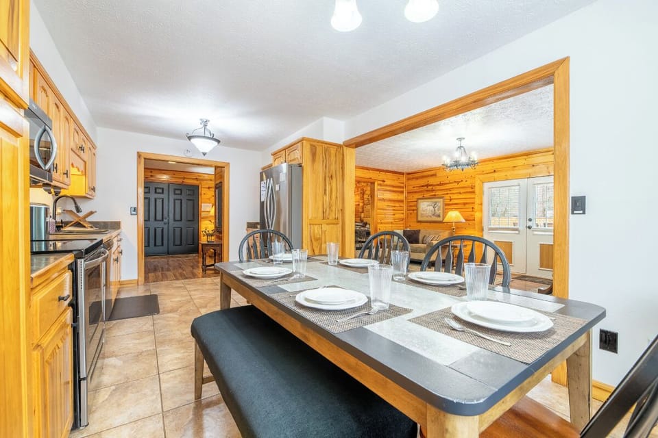 Gather around your spacious kitchen island where warm wood tones create the perfect setting for memorable meals together.