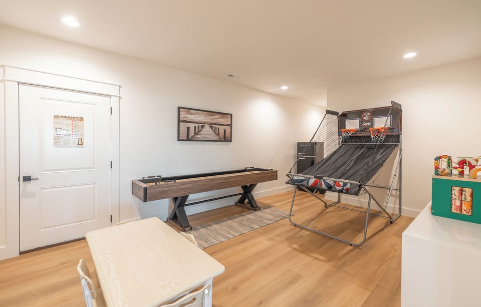 Game room with drink fridge.