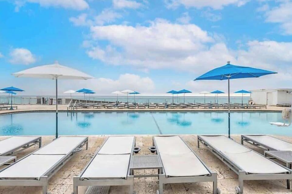 Relax at the sparkling outdoor pool, perfect for sunny days.