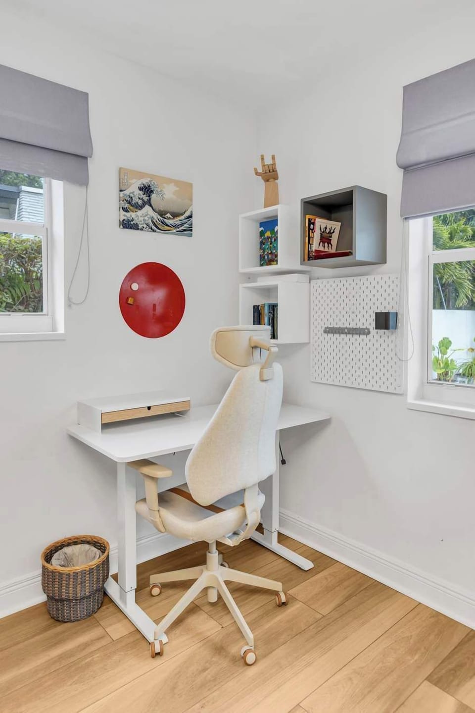 Stylish work area with built-in shelving for a productive stay.