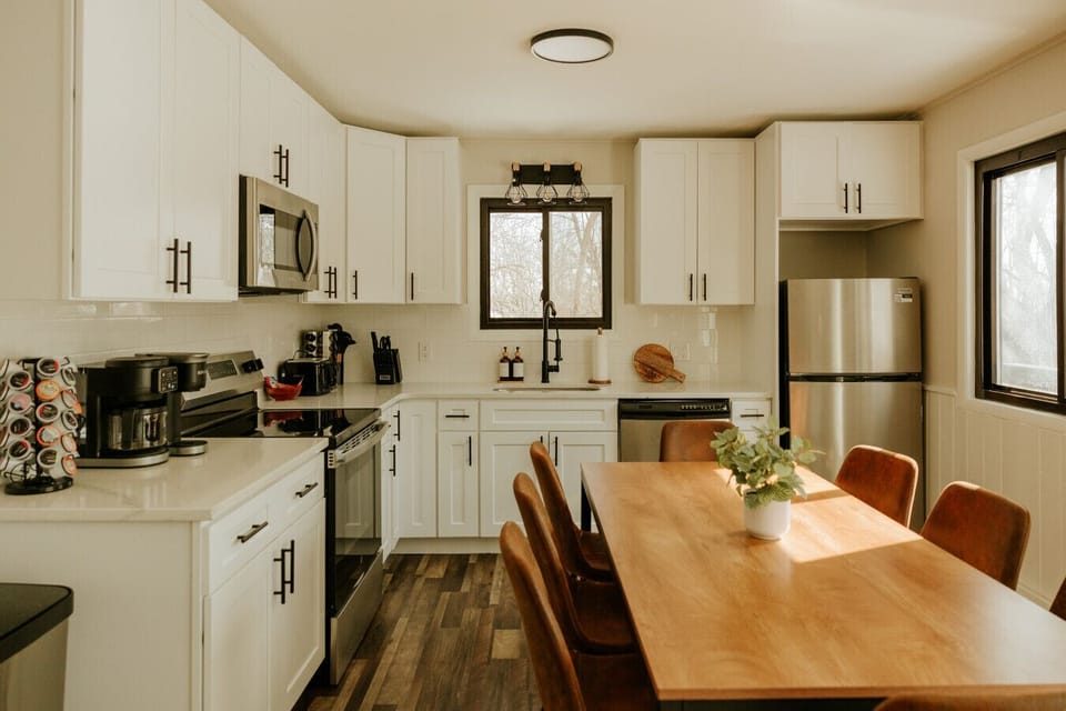 Bright, fully equipped kitchen with cozy dining space