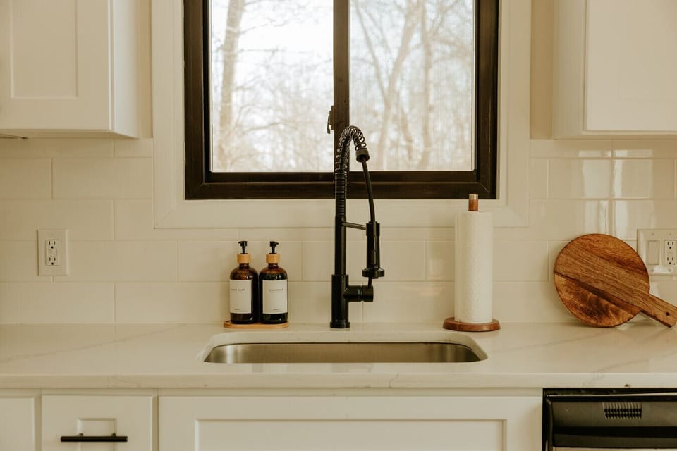 Sunlit sink with sleek finishes and modern touches