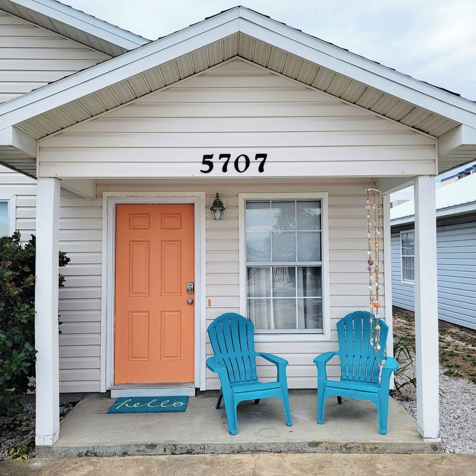 Beach house private entrance with porch seating