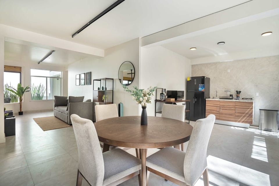 
Gather for meals in our bright, open dining area, connected to the living room.