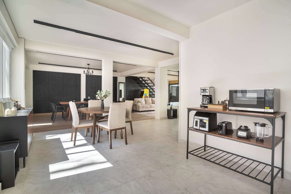 Combined dining and kitchen area, ideal for entertaining and family gatherings.