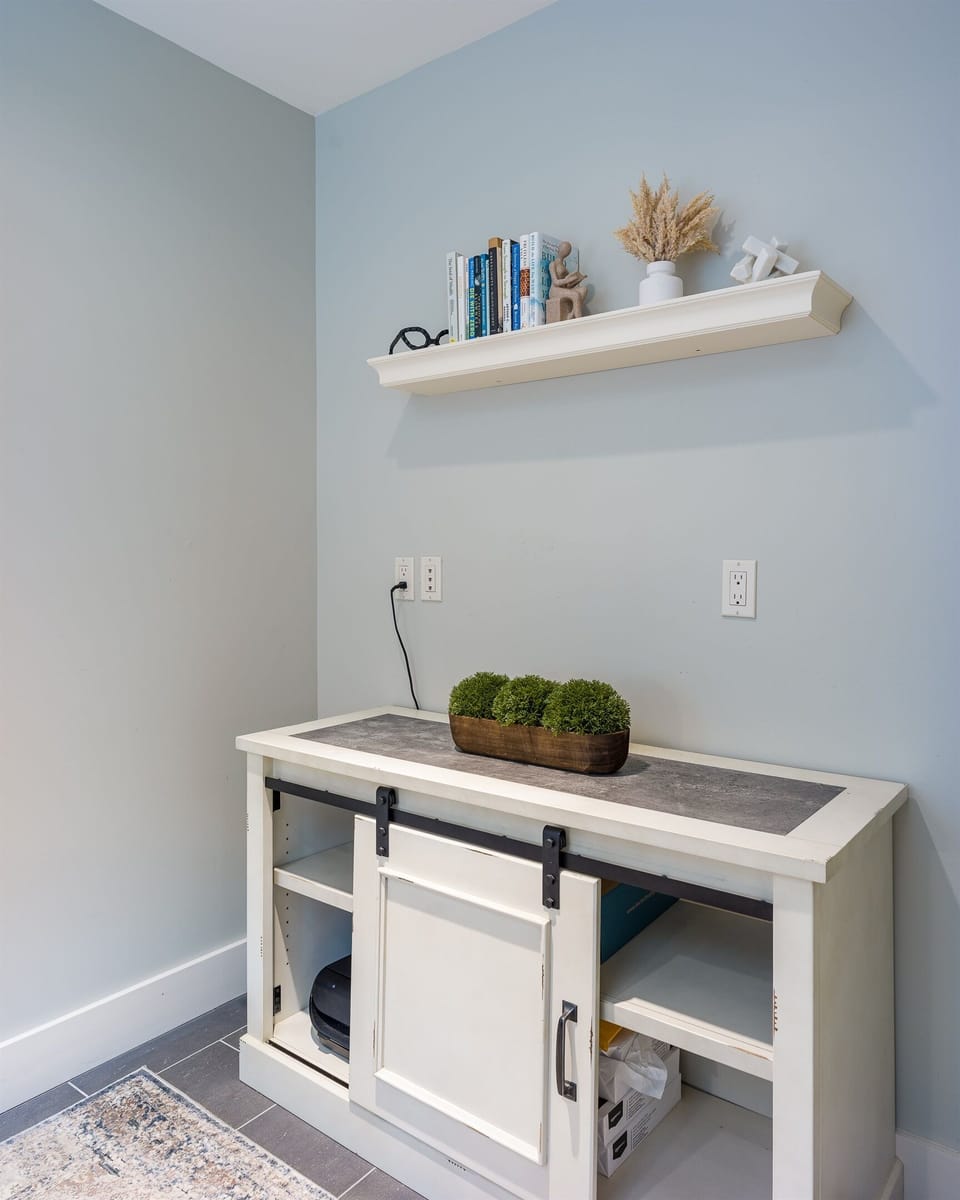 Credenza located inside office compete with printer and paper for your use.