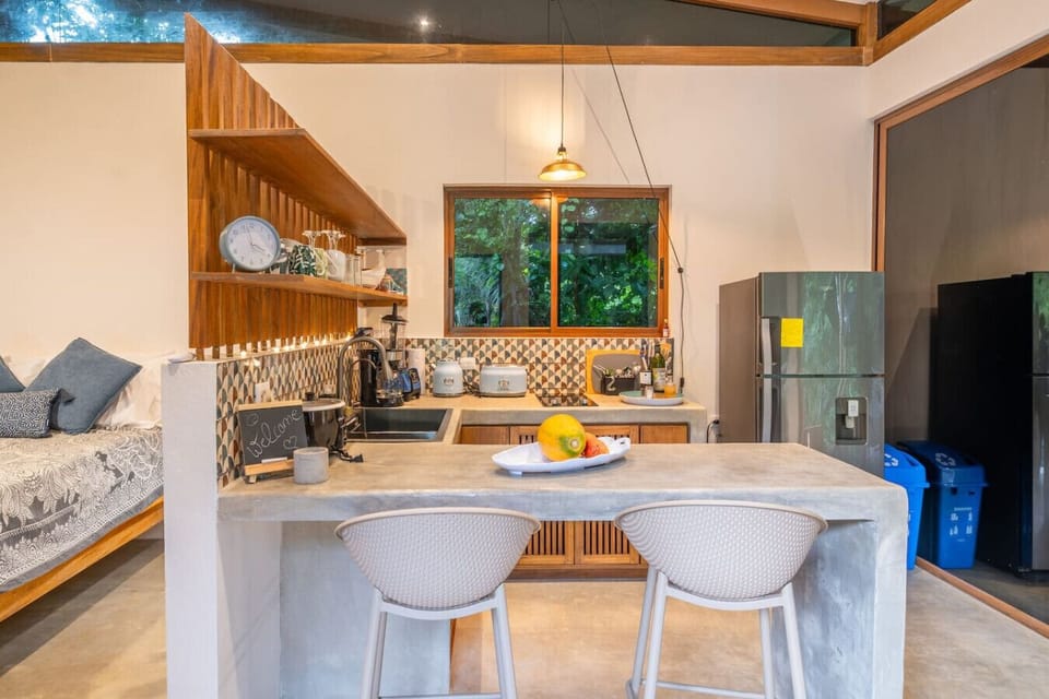 Fully equipped kitchen with breakfast bar in Puerto Viejo