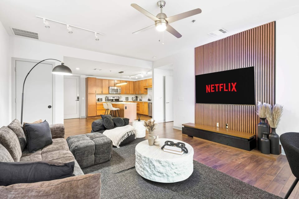 Enjoy immersive entertainment with a large TV and ambient lighting that sets the perfect mood for relaxing nights in.