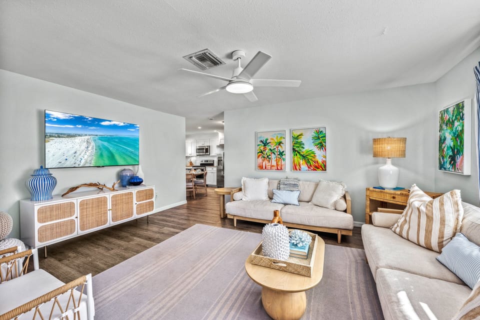 Relax on the comfortable seating surrounded by light-filled spaces and airy, beachy décor.
