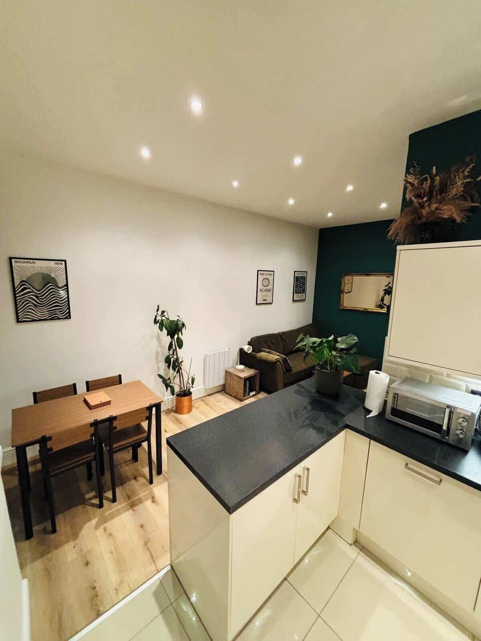 Enjoy our stylish living, dining, and well-equipped kitchen with a microwave. Tissues provided for your convenience. Book your escape!