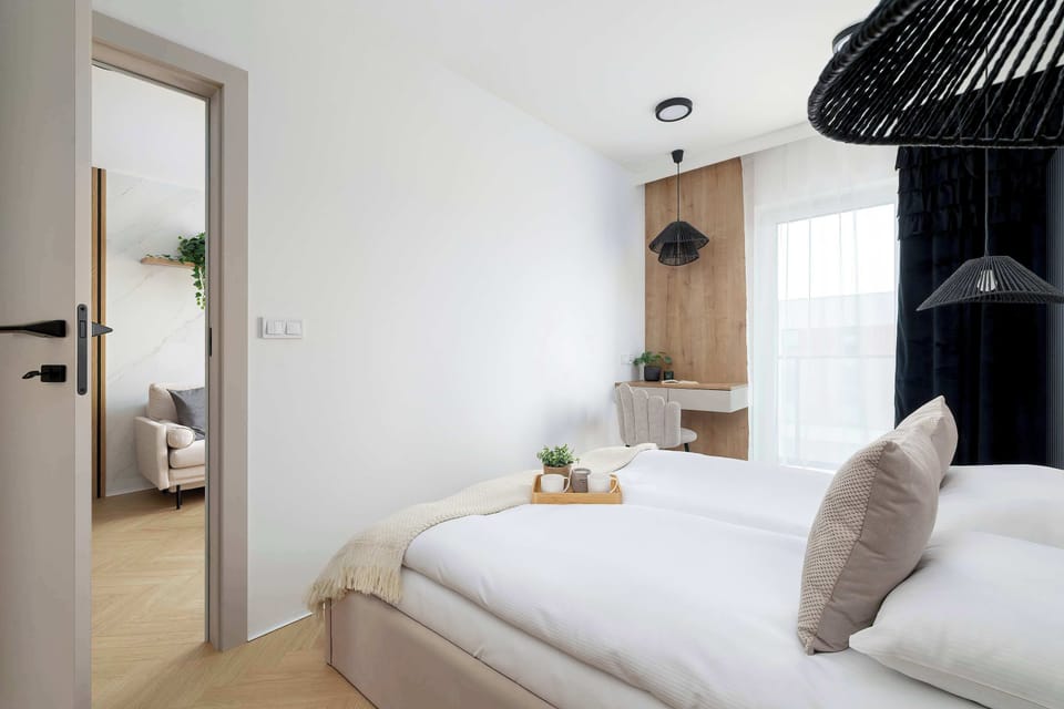 Bedroom view with clean lines and warm wood details.