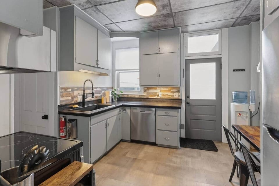 Fully equipped kitchen with water cooler.  